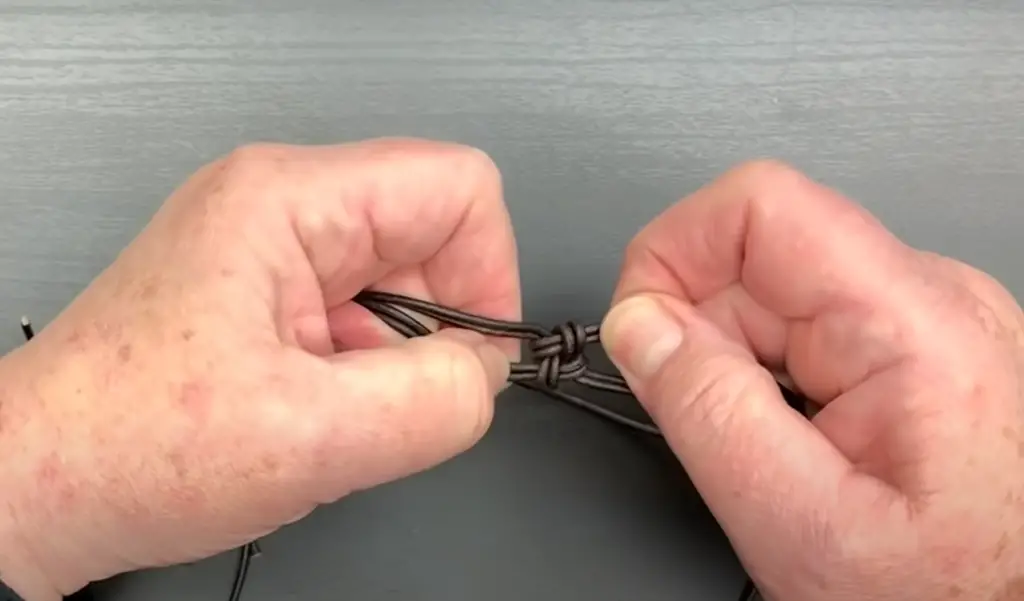 How do you tie a leather band bracelet?
